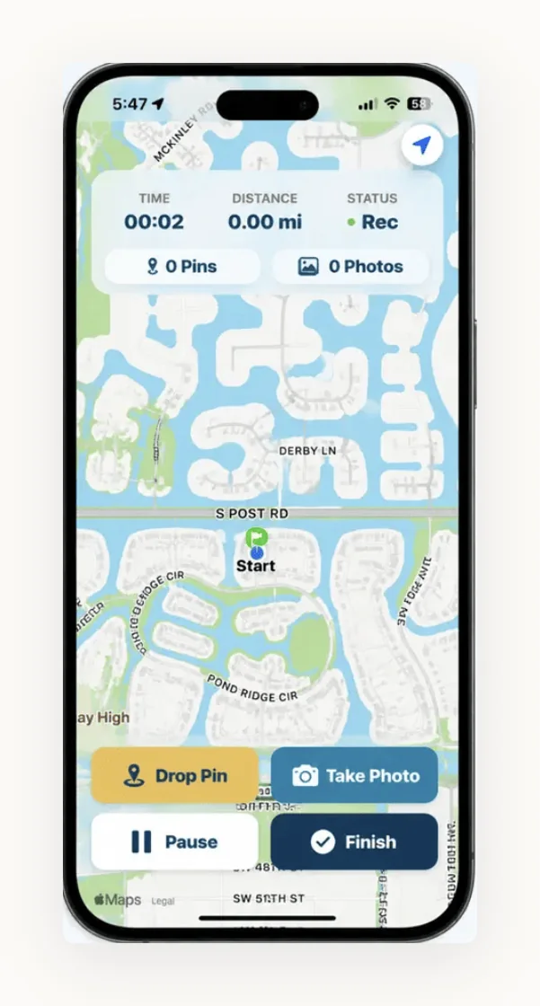 A PaddlePin paddle in progress on the map screen, showing the recorded route, time, distance, and controls to drop a pin or take a photo